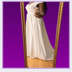 Beautiful A line dress with split. Looks great for someone curvy. belt included!